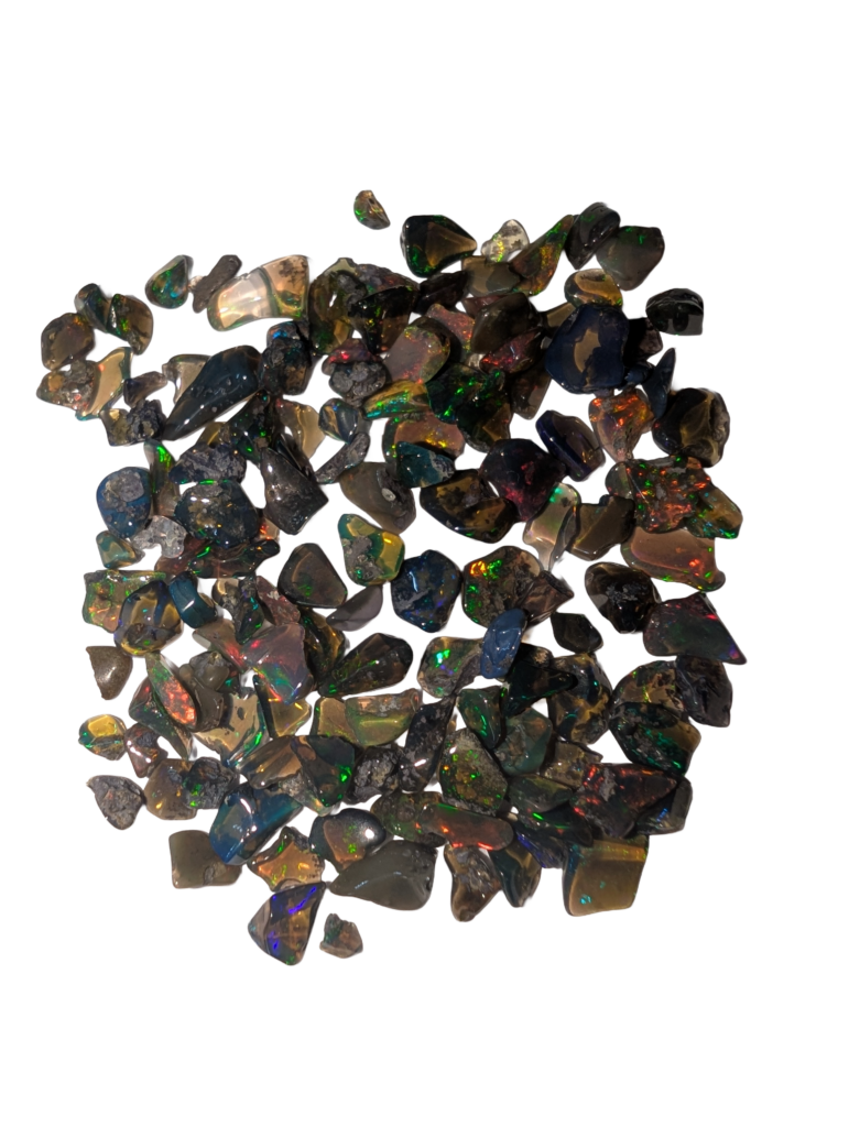 Black Fire Opal
Intense and dramatic. The Black Fire Opal is known for its dark, smoky base that makes the internal "flames" of red, orange, and green pop with incredible contrast. It is the ultimate choice for a sophisticated, high-end look with a mysterious edge.